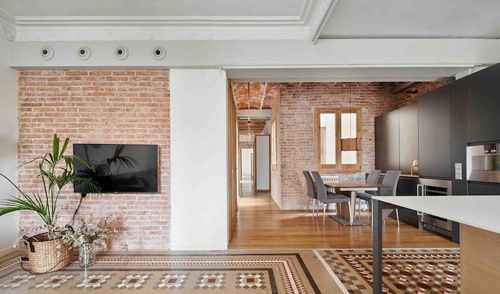 The house combines red and mosaic tiles